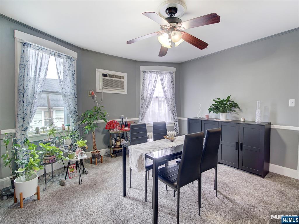 140 Westervelt Avenue Hawthorne, NJ 07506 - Photo 24 of 36 a view of a dining room with furniture window and outside view