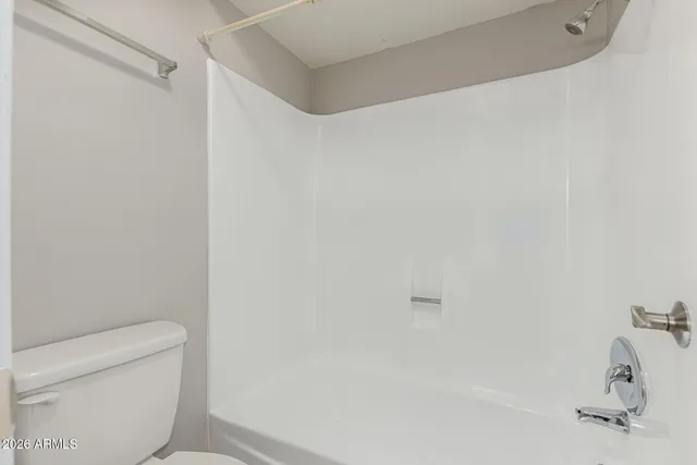 a bathroom with a shower curtain