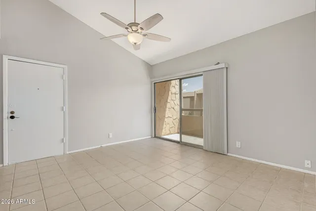 an empty room with fan