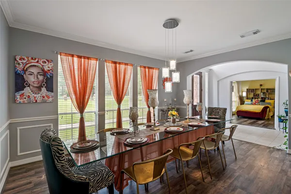 a view of a dining room with furniture window and outside view