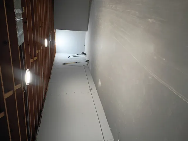 an empty room with windows