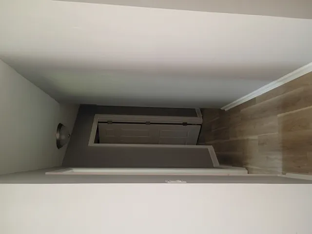 a view of storage and utility room