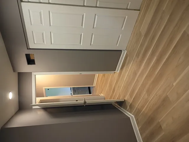 a view of staircase with window