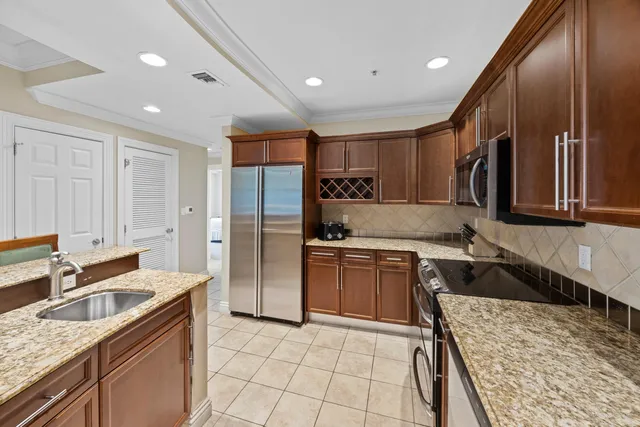 a kitchen with a table and chairs in it