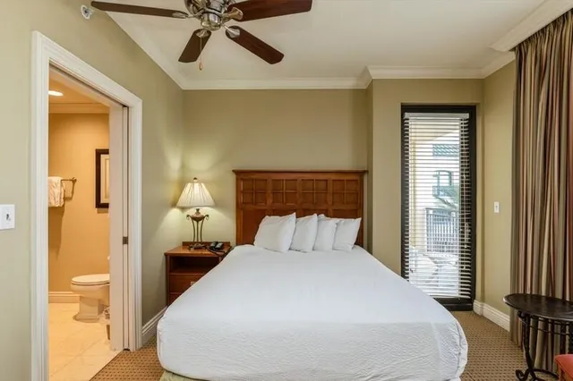 a bedroom with a bed and furniture