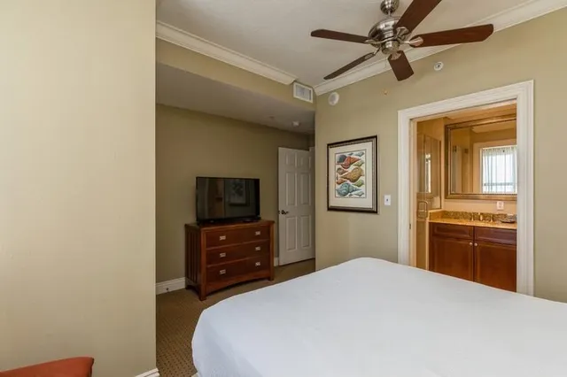 a spacious bathroom with a granite countertop sink mirror and shower