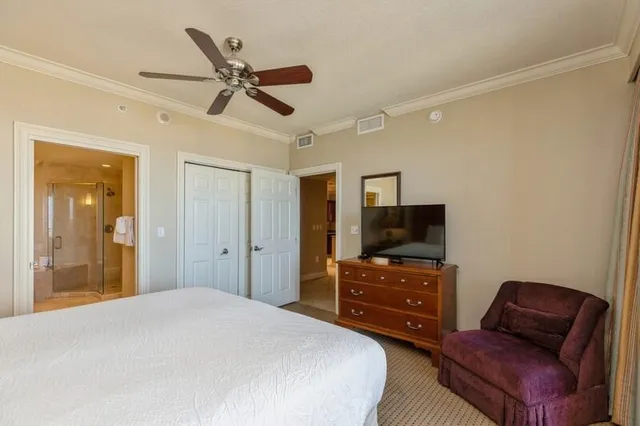 a bathroom with a granite countertop double vanity sink and a mirror