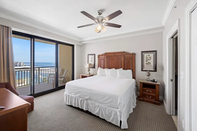 a spacious bathroom with a granite countertop sink a toilet and a mirror