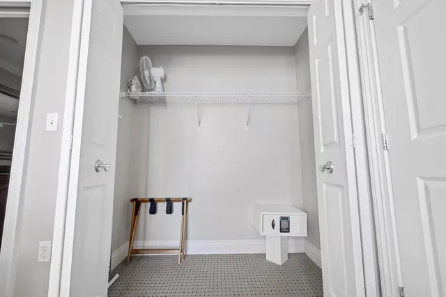 a view of balcony with furniture