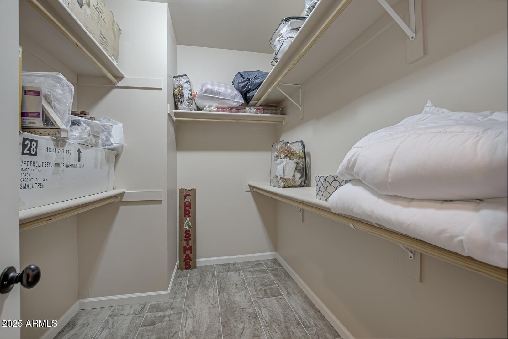 5076 Juniper Loop Pine, AZ 85544 - Photo 28 of 68 a living room with furniture and wooden floor