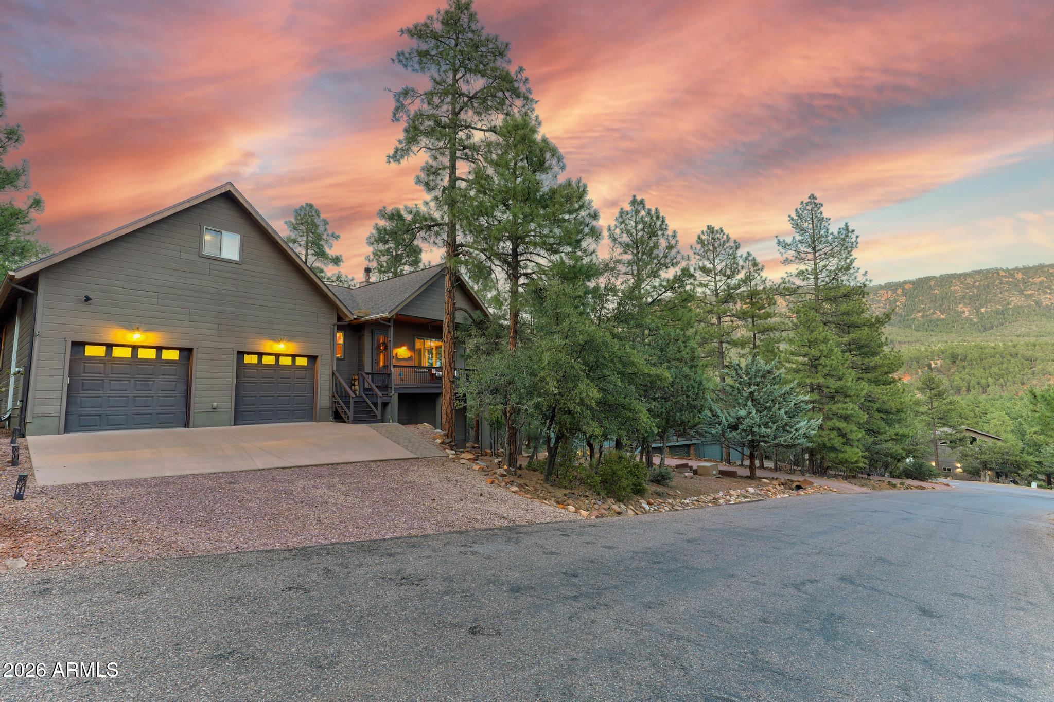 5076 Juniper Loop Pine, AZ 85544 - Photo 67 of 68 a view of road and trees in the background