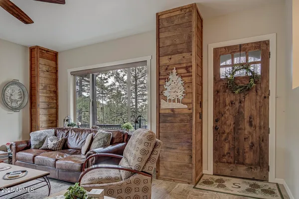 a living room with furniture and a window