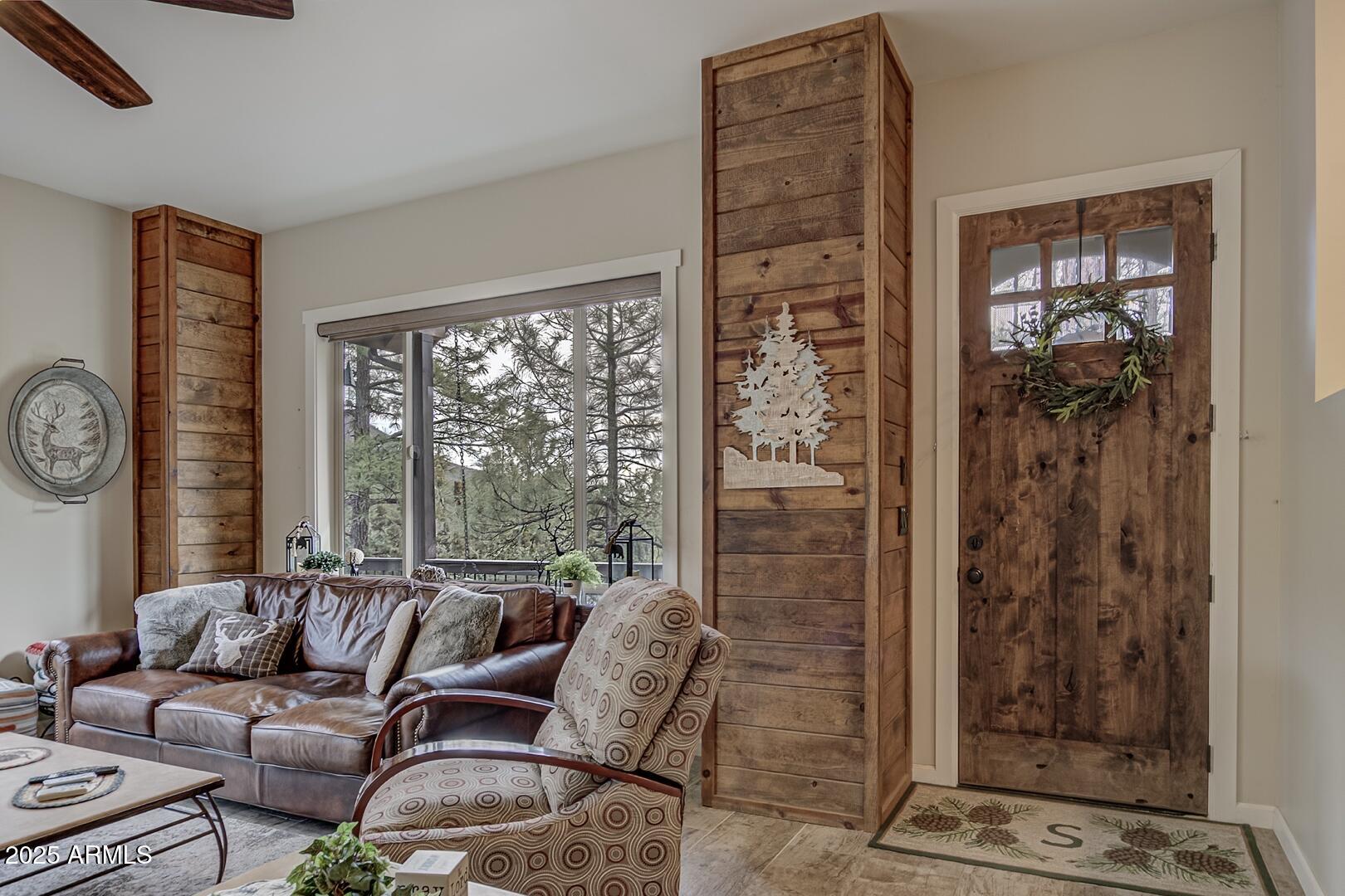 5076 Juniper Loop Pine, AZ 85544 - Photo 7 of 68 a living room with furniture and a window