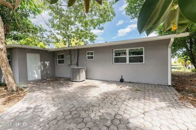 front view of a house with a dry yard