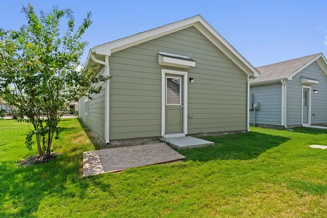 a view of a backyard with a garden