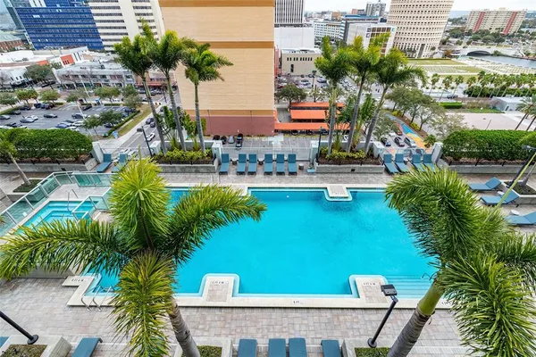a view of a city with lawn chairs