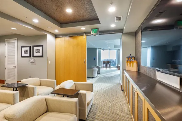 a living room with a couch and a flat screen tv