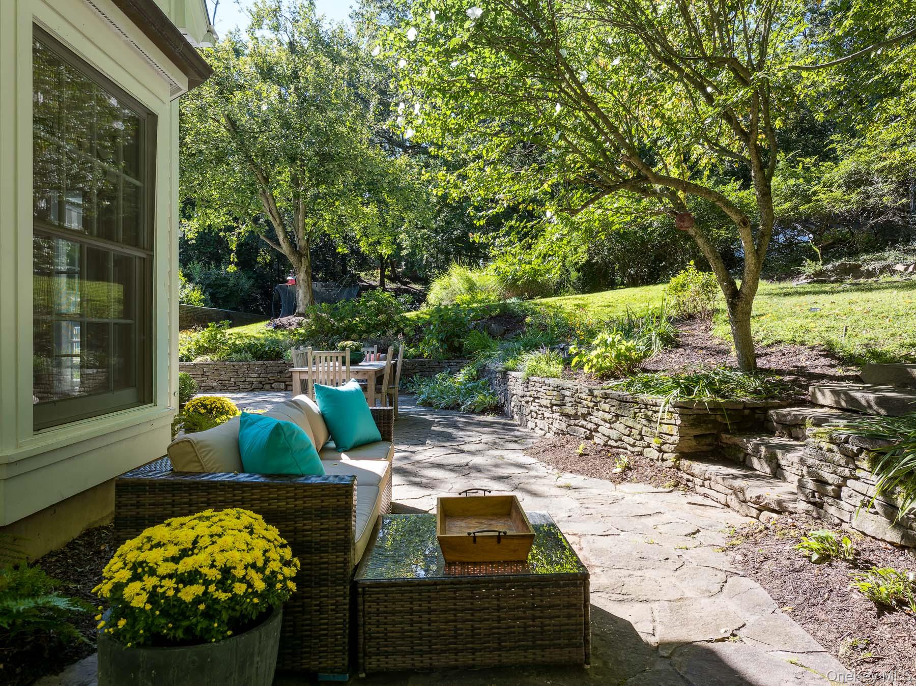 71 Havemeyer Road Irvington, NY 10533 - Photo 15 of 38 a view of backyard with outdoor seating and green space