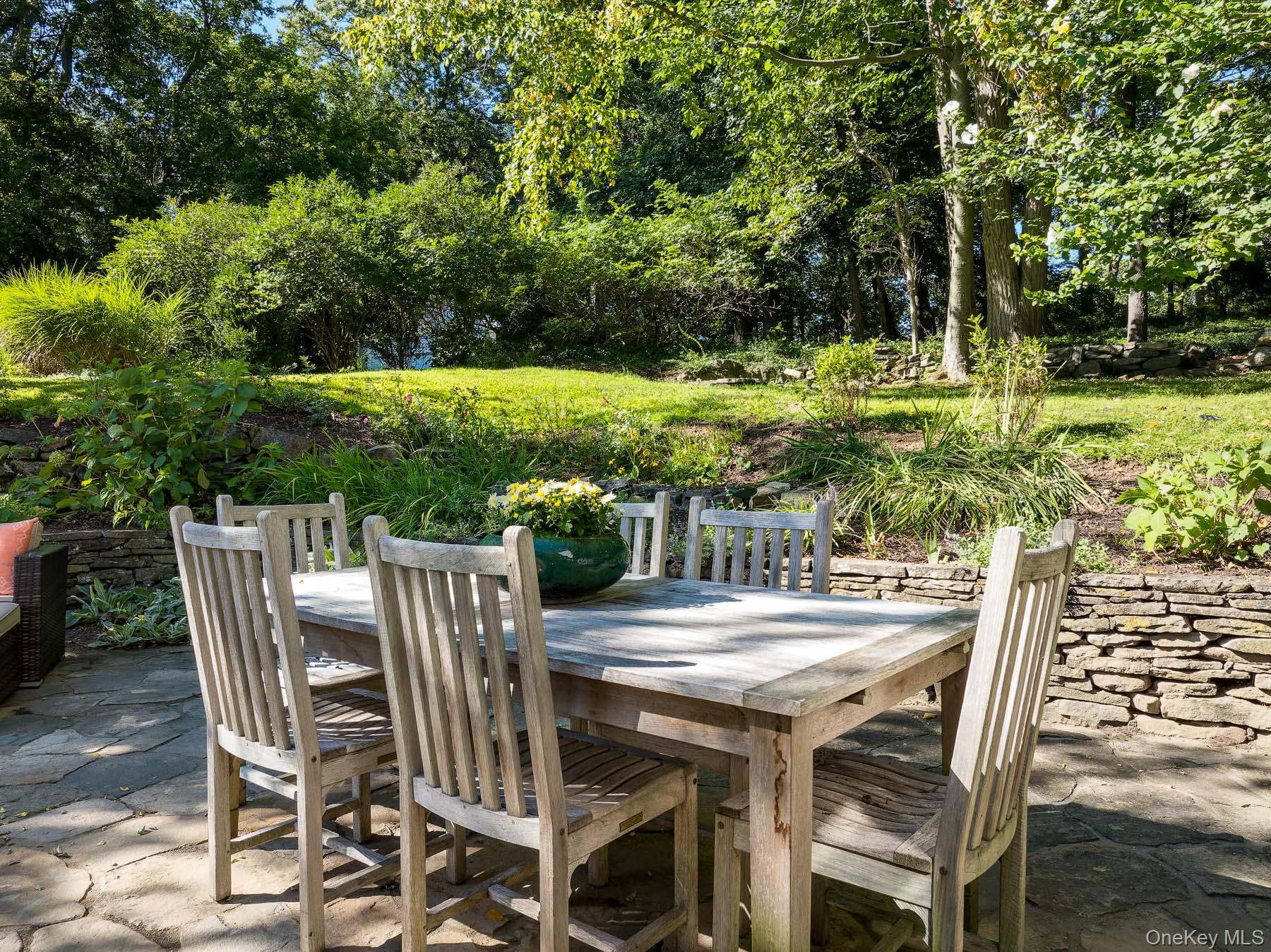 71 Havemeyer Road Irvington, NY 10533 - Photo 16 of 38 a view of an chairs and table in the patio
