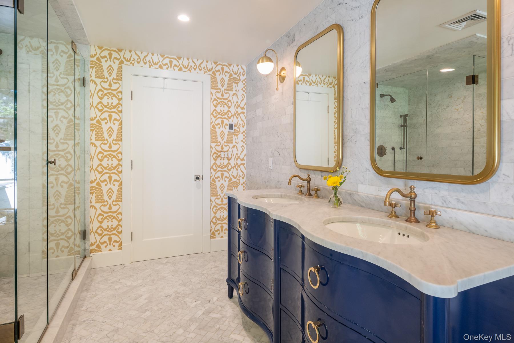 71 Havemeyer Road Irvington, NY 10533 - Photo 23 of 38 a bathroom with a double vanity sink mirror and double