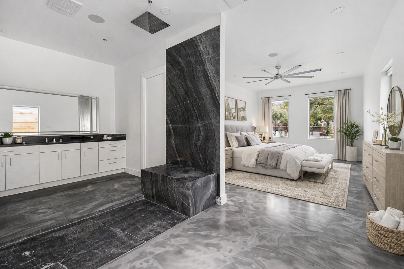 3735 University Boulevard Houston, TX 77005 - Photo 11 of 18 a bedroom with furniture and a large window