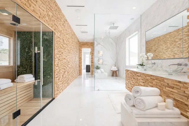 a large room with a large window and furniture