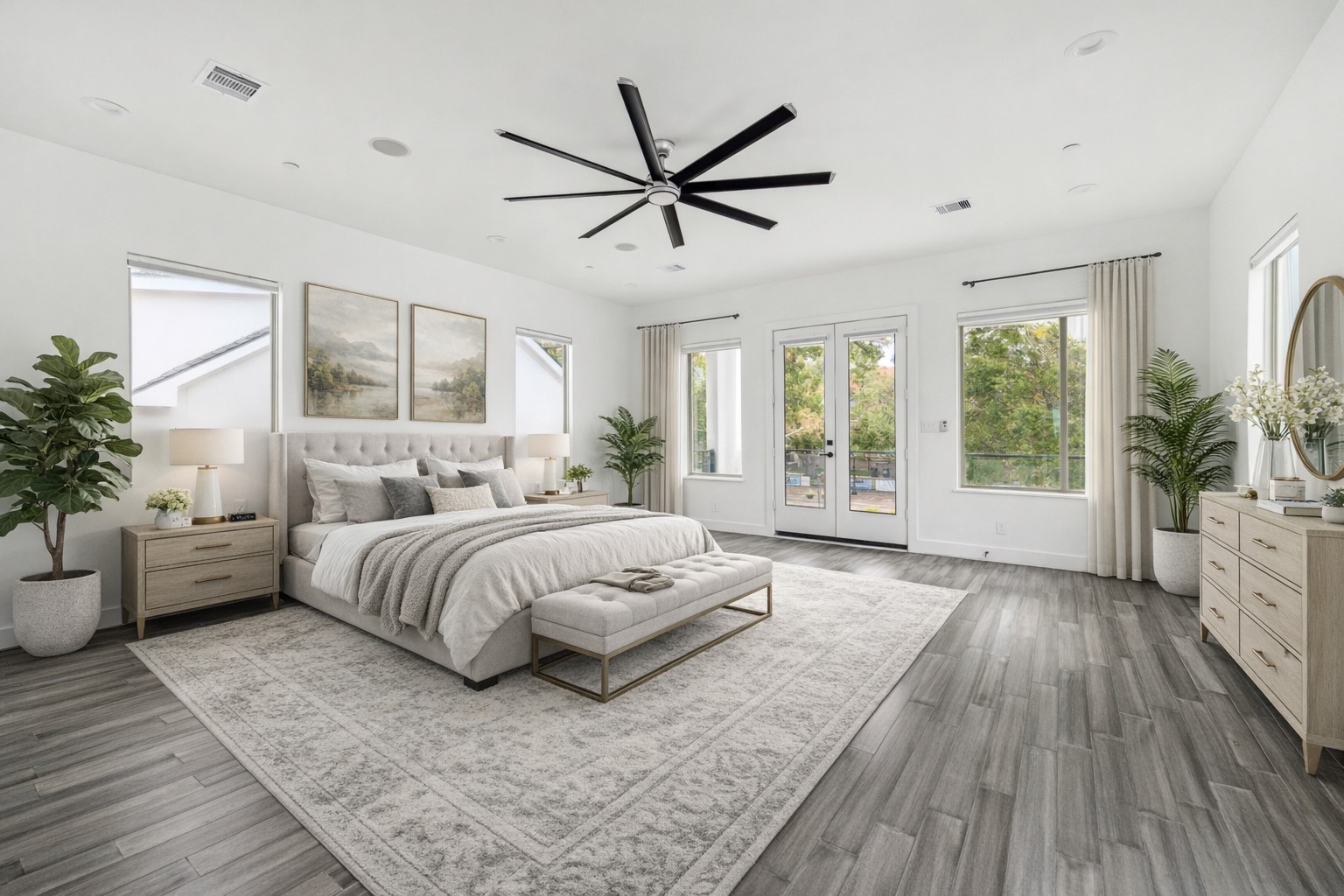 3735 University Boulevard Houston, TX 77005 - Photo 6 of 18 a spacious bedroom with a large bed and windows