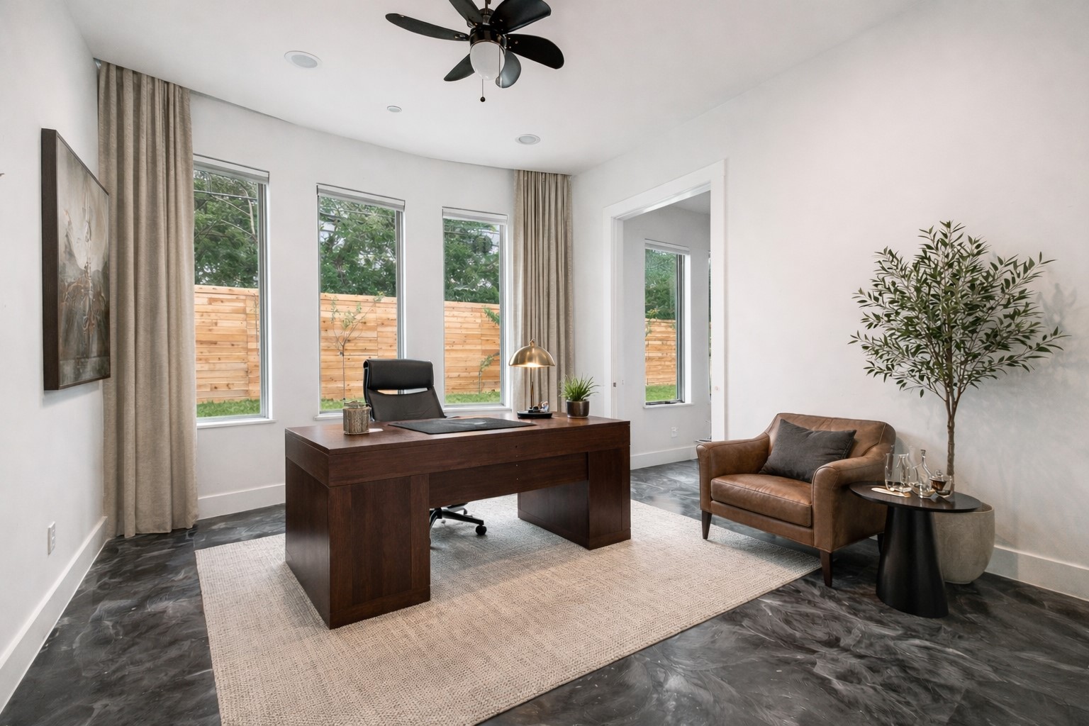 3735 University Boulevard Houston, TX 77005 - Photo 8 of 18 a living room with furniture and a potted plant