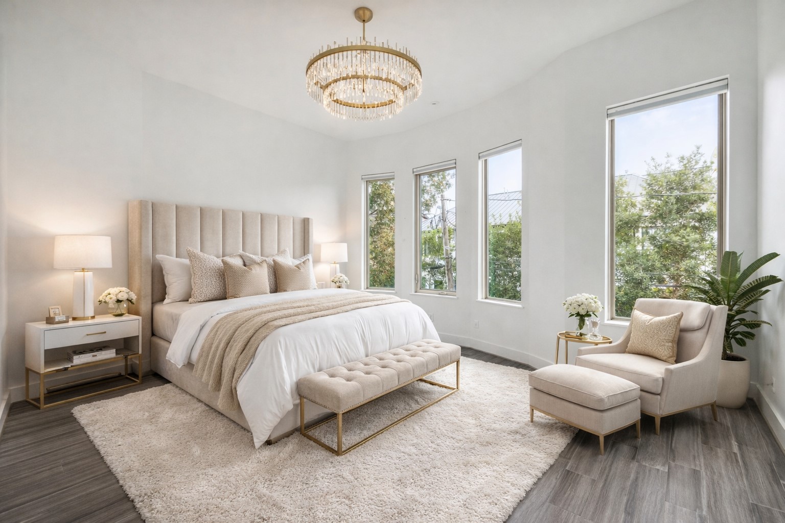 3735 University Boulevard Houston, TX 77005 - Photo 9 of 18 a spacious bedroom with a bed and wooden floor