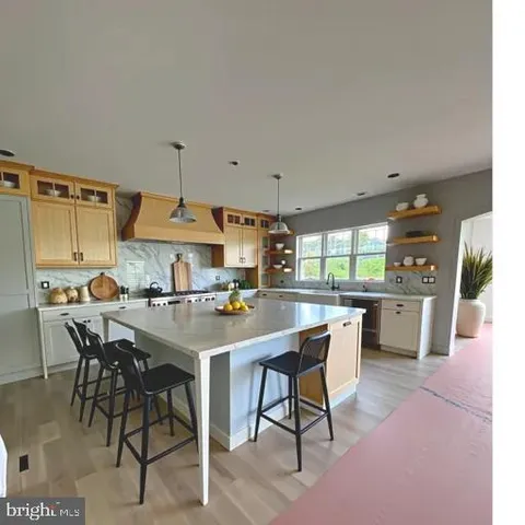 a view of a dining room kitchen and furniture