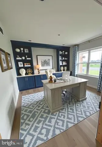 a living room with a couch and a table