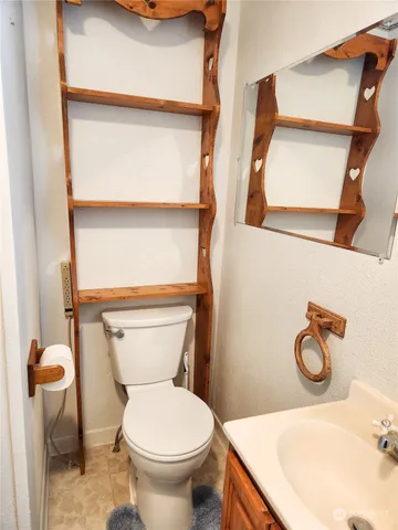 a bathroom with a sink and a toilet