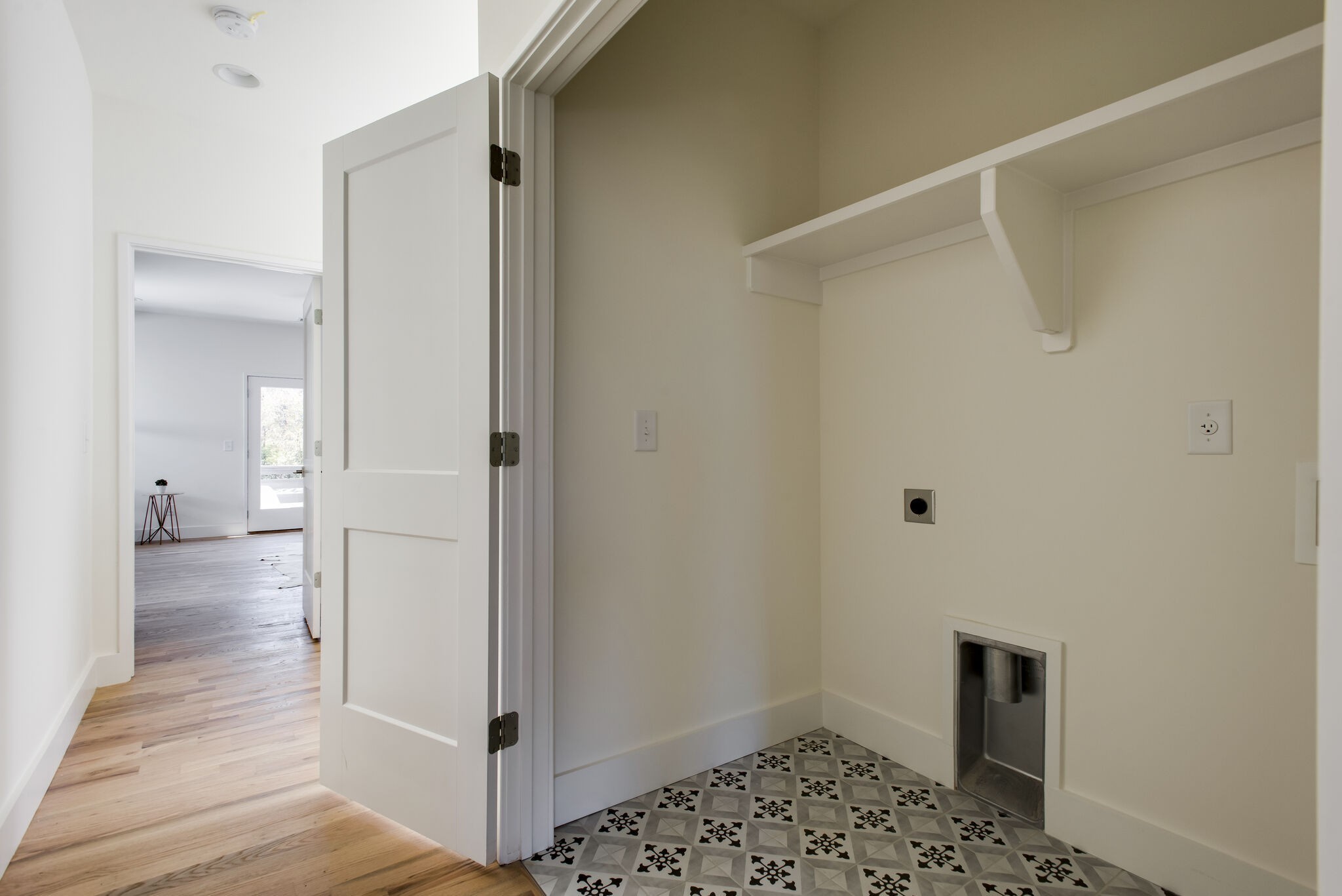 206 Ben Allen Road, Unit 2 Nashville, TN 37207 - Photo 24 of 28 a view of a hallway with wooden floor and a bathroom