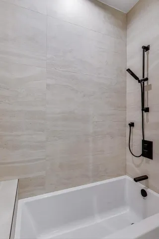 a bathroom with a bathtub