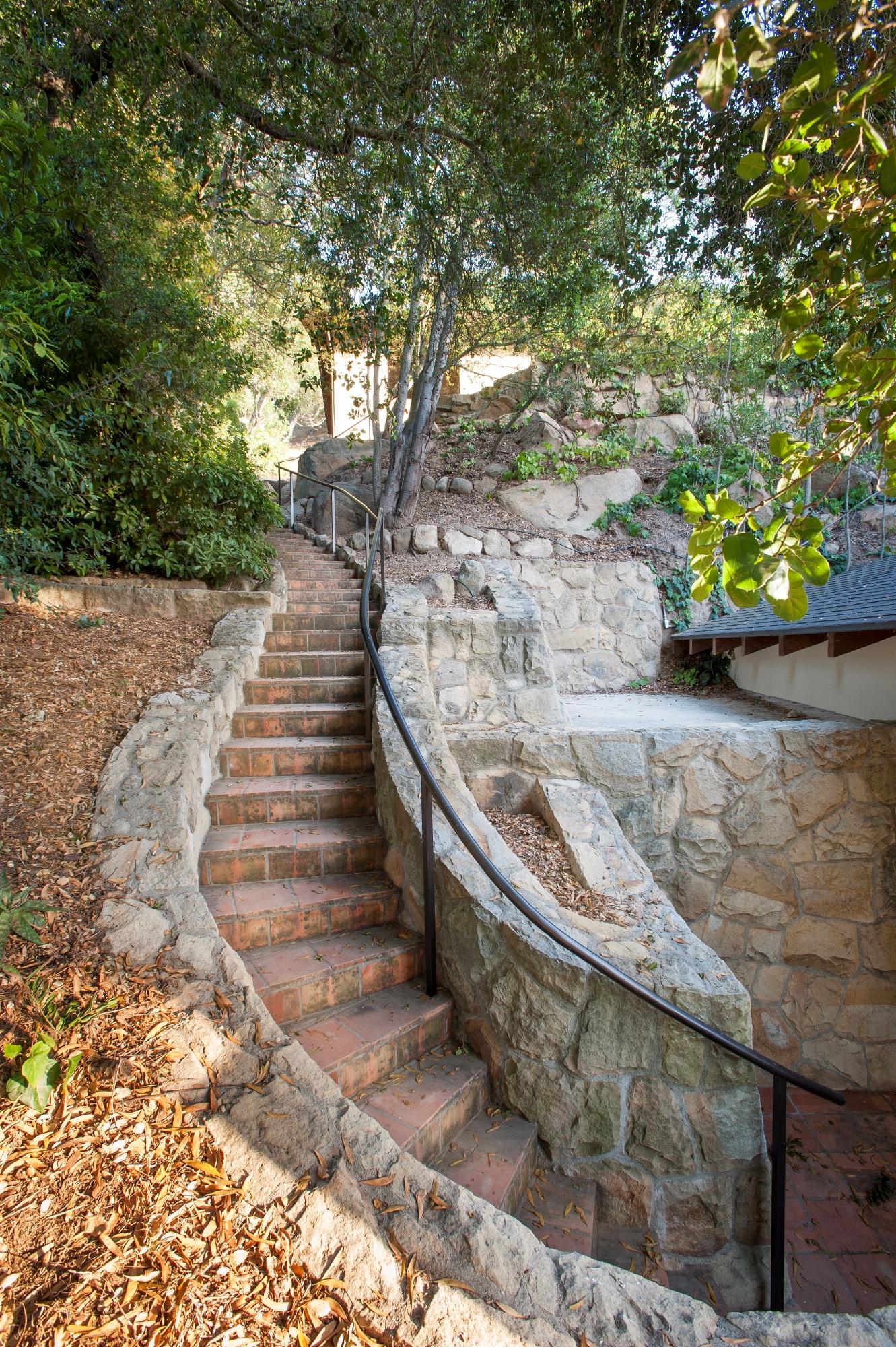 398 Mountain Drive Santa Barbara, CA 93103 - Photo 23 of 28 a view of a yard with large trees