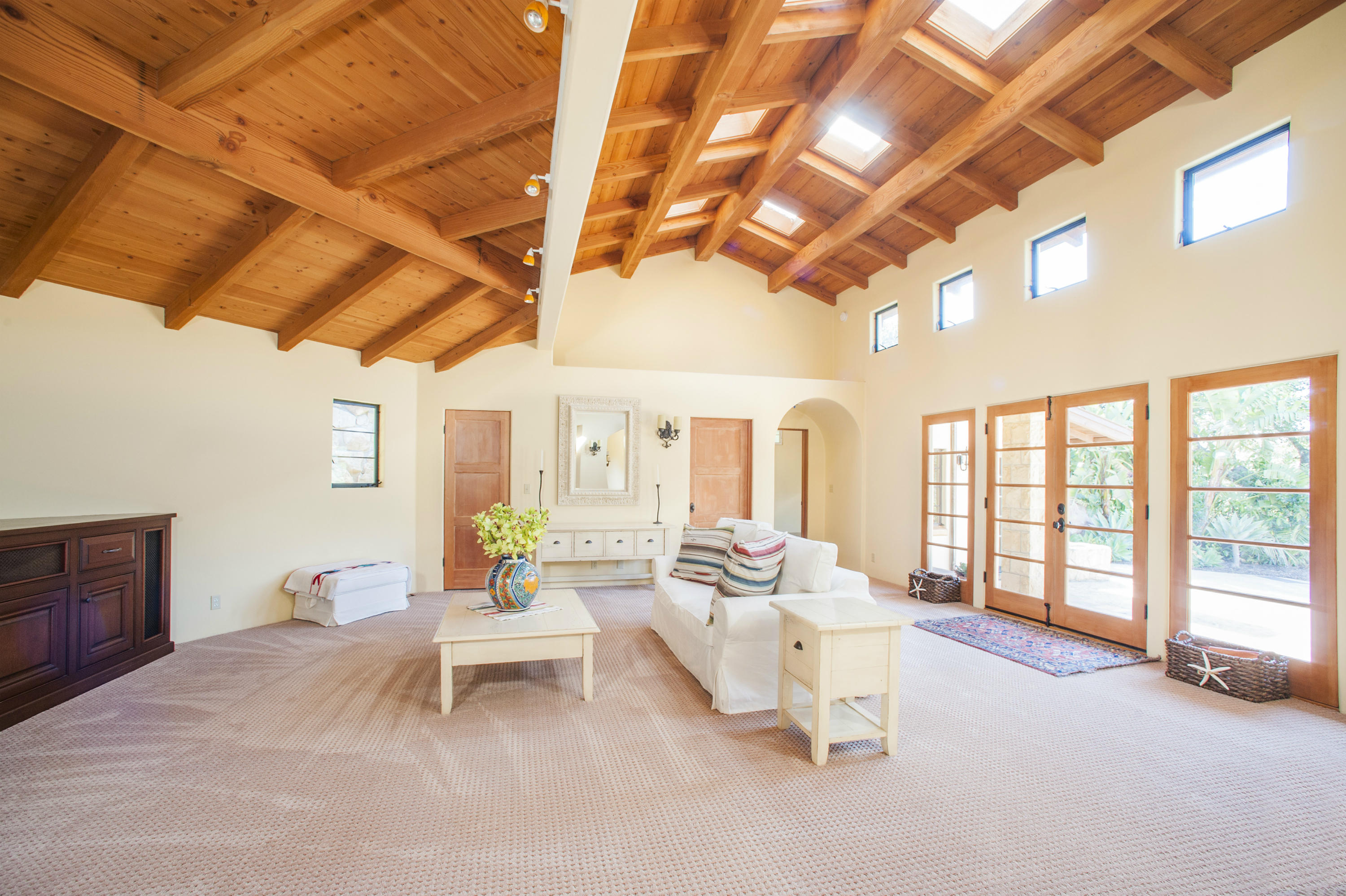 398 Mountain Drive Santa Barbara, CA 93103 - Photo 9 of 28 a living room with furniture and a chandelier