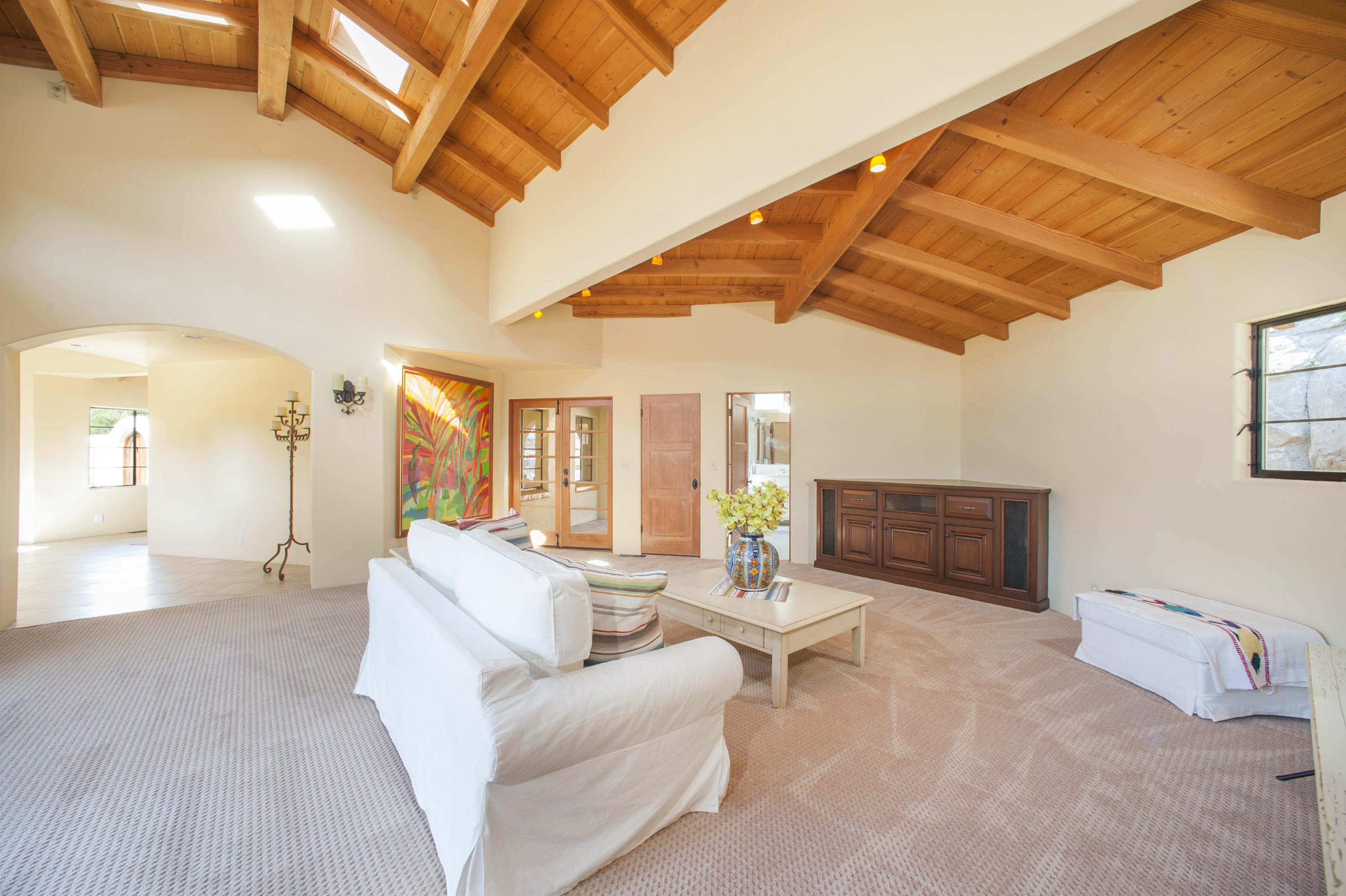 398 Mountain Drive Santa Barbara, CA 93103 - Photo 10 of 28 a living room with furniture and a open kitchen