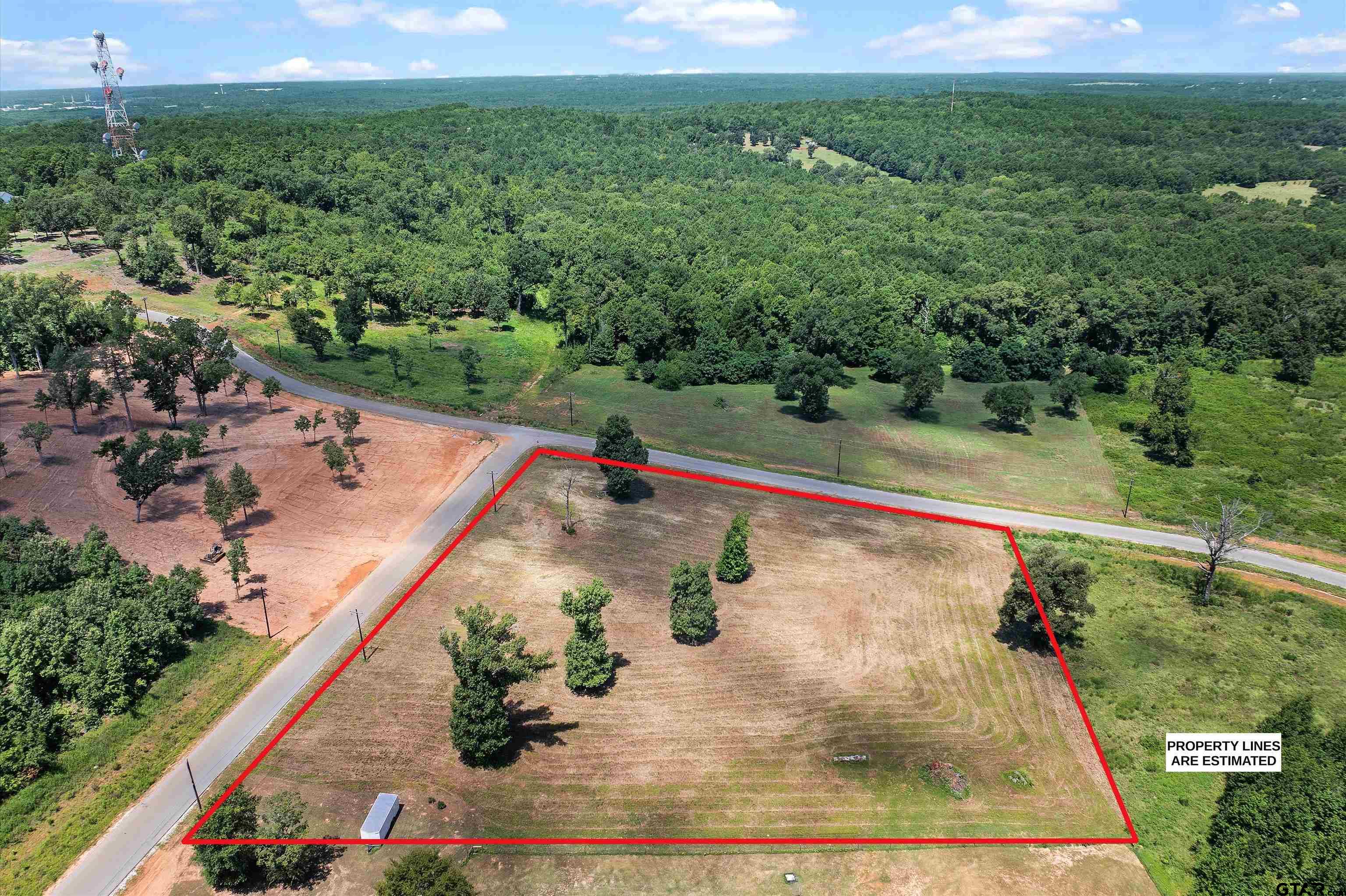 Tbd Tbd Ridgeline Loop Winona, TX 75792 - Photo 7 of 9 a view of a swimming pool with a yard