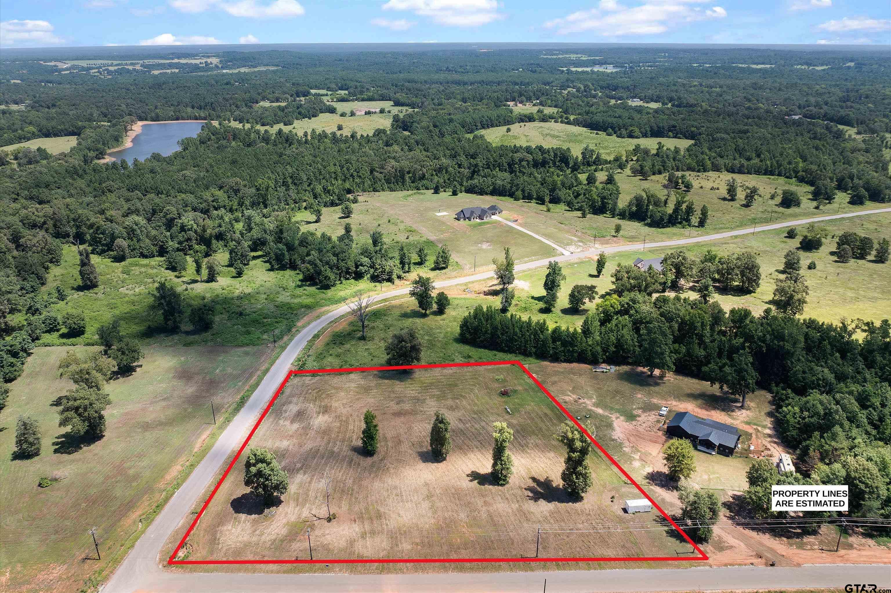 Tbd Tbd Ridgeline Loop Winona, TX 75792 - Photo 8 of 9 an aerial view of a house