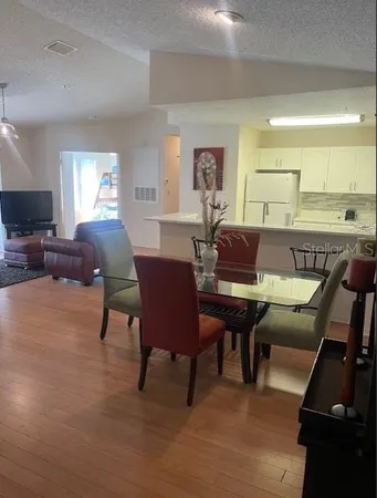 a view of a dining room with furniture