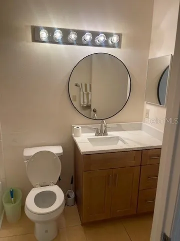 a bathroom with a toilet and a sink