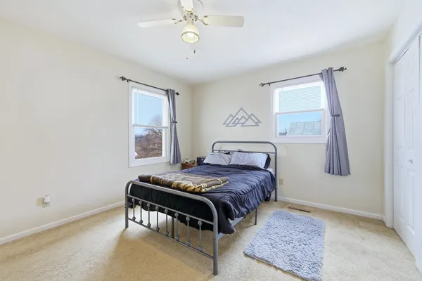 a living room with hard wood floors