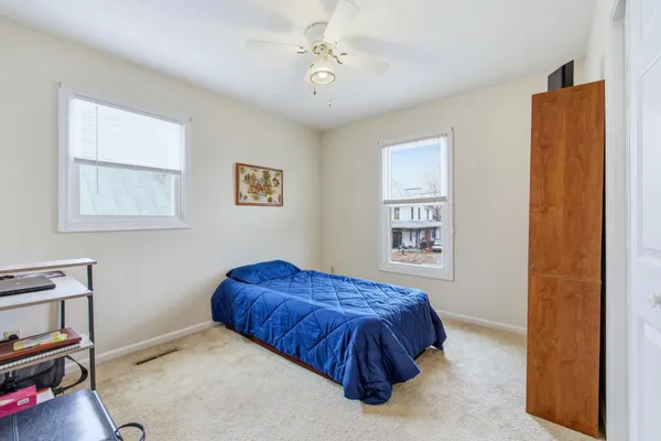 a bathroom with a toilet and a sink