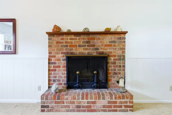 a room with furniture and a wooden floor