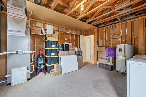 a backyard of a house with a tree