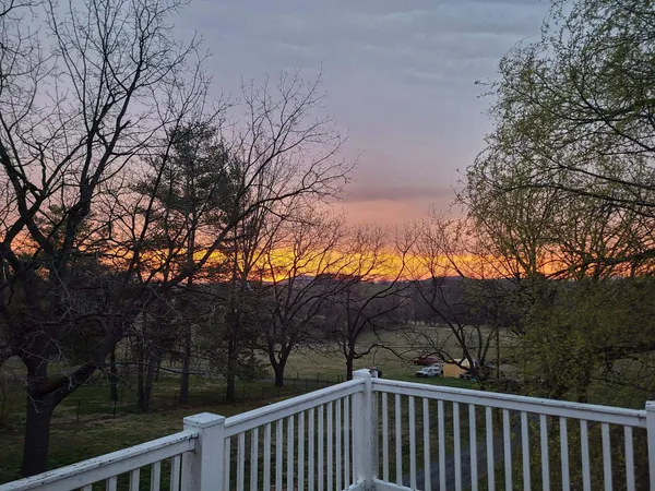 a view of a balcony with mountain view