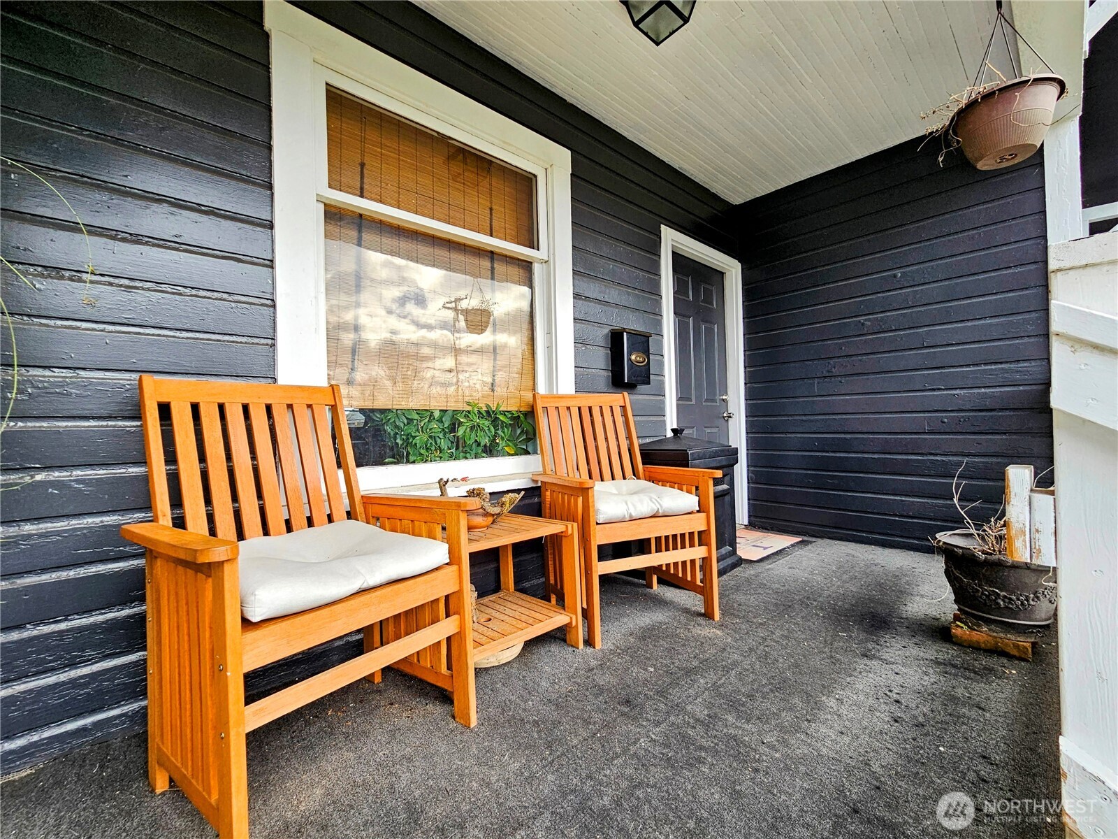 638 Northwest Folsom Street Chehalis, WA 98532 - Photo 2 of 12 a backyard of a house with wooden floor and outdoor seating