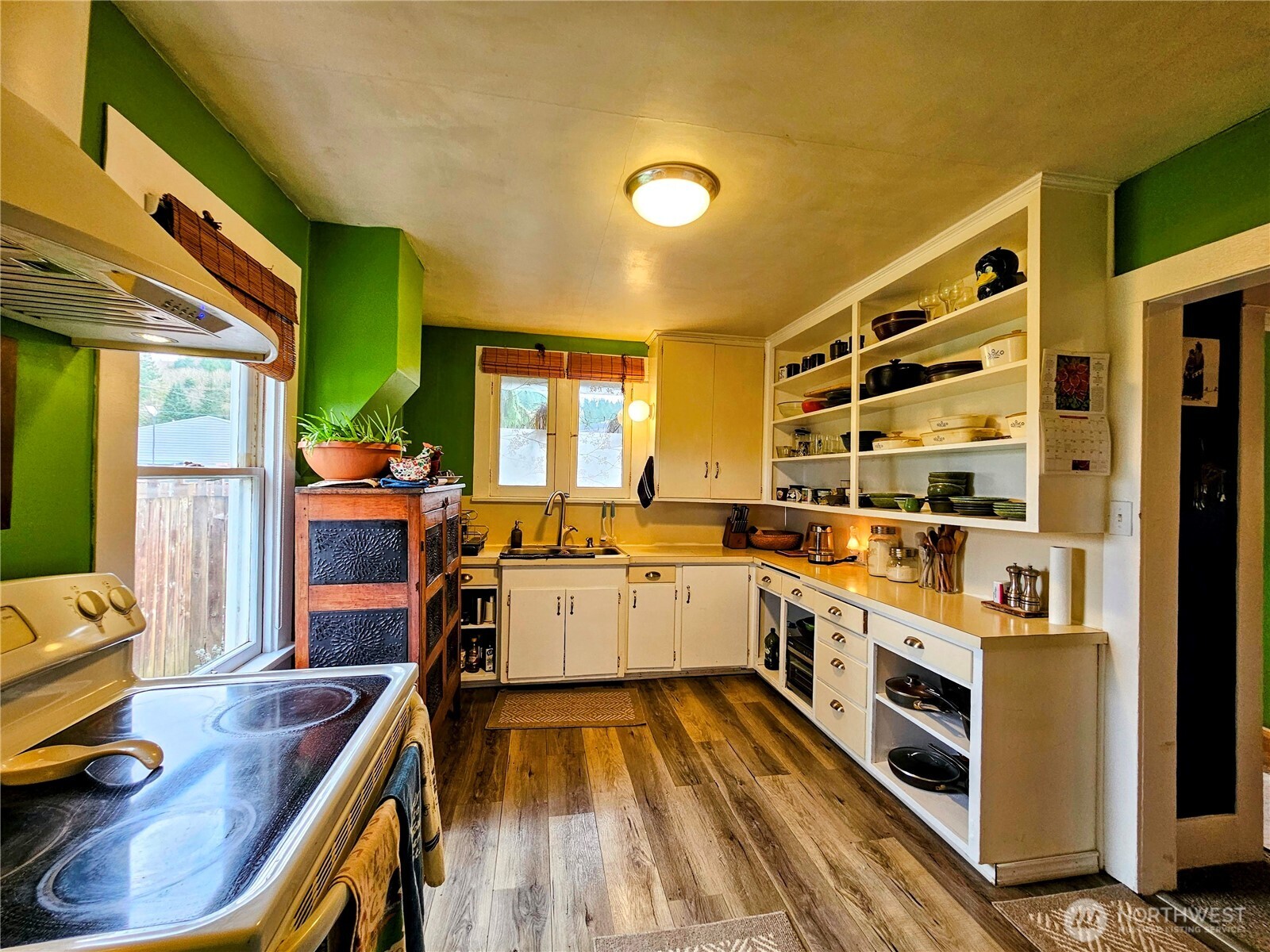 638 Northwest Folsom Street Chehalis, WA 98532 - Photo 10 of 12 a kitchen with a sink appliances and cabinets