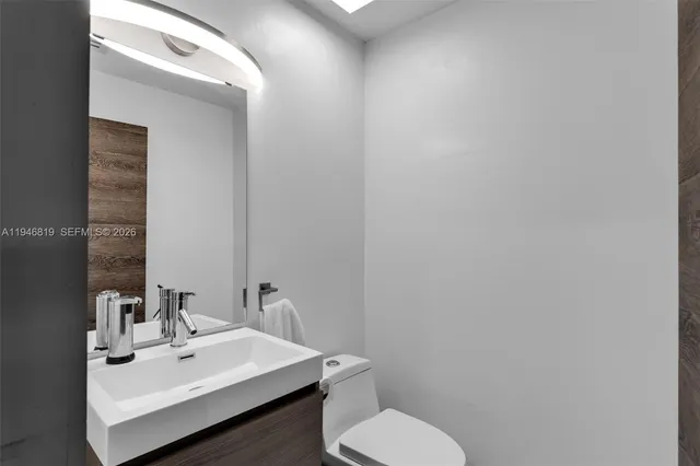 a view of a swimming pool with an outdoor space and seating area