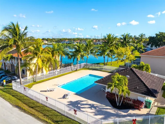a view of swimming pool with a patio